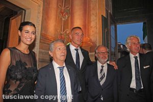 Alice Sabatini con gli ideatori delle macchine di Santa Rosa