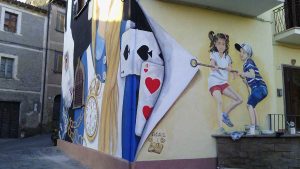 Viterbo - Sant'Angelo - Il murale dell'artista Tina Loiodice "I bambini scoprono la fiaba di Alice"