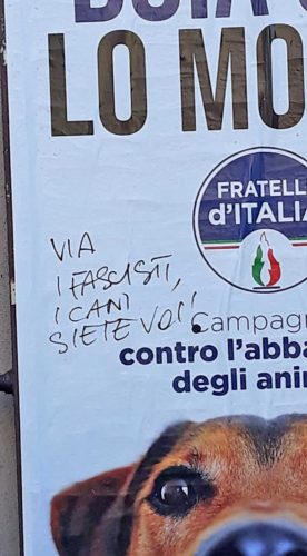 Il manifesto di FdI contro l'abbandono degli animali imbrattato dai vandali