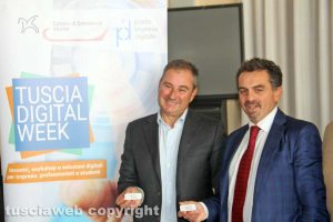 Domenico Merlani e Francesco Monzillo con i token per la firma digitale
