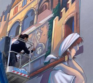 Viterbo - Alessandra Carloni al Pilastro mentre lavora al murale di S. Rosa