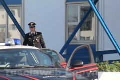 Gli arrestati escono dalla caserma dei carabinieri di Viterbo