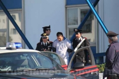 Gli arrestati escono dalla caserma dei carabinieri di Viterbo