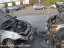 Auto in fiamme al centro commerciale