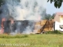 Balle di fieno in fiamme su un autocarro