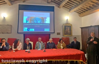 Viterbo - La cerimonia di posizionamento dell'opera di Santa Rosa restaurata all’interno del monastero