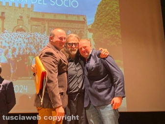 Viterbo - Consegna dei ciuffi a chi ha terminato il servizio attivo di facchino di Santa Rosa