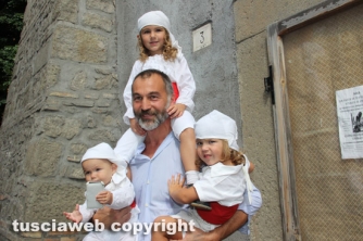 Raffaele Ascenzi coi figli facchini