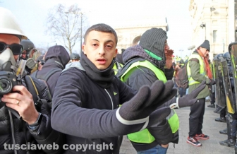 Parigi, i volti in mezzo alla battaglia - 8 dicembre - Foto Daniele Camilli