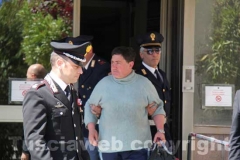Gli arrestati escono dalla Questura, diretti a Mammagialla