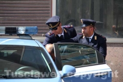 Gli arrestati escono dalla Questura, diretti a Mammagialla