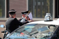 Gli arrestati escono dalla Questura, diretti a Mammagialla