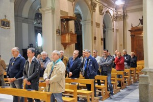 In attesa della messa di padre Romano