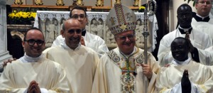 I tre nuovi sacerdoti con il vescovo Romano Rossi