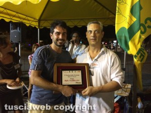 Festival della porchetta made in Tuscia -  Marco Cataudella premia Nicola Ferri