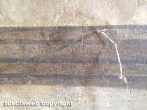 Il nastro adesivo sull'affresco a Palazzo dei priori