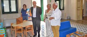 Il sindaco Mazzola, l'assessore Ravera e il presidente della commissione consiliare Centini alla biblioteca comunale