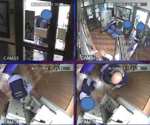 I rapinatori in azione, ripresi dalle telecamere della banca