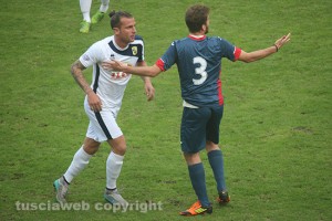 Sport - Calcio - Alessandro Romeo e Matteo Sagnotti durante il derby della Tuscia