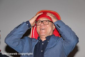 Carlo Verdone con il ciuffo dei facchini di santa Rosa