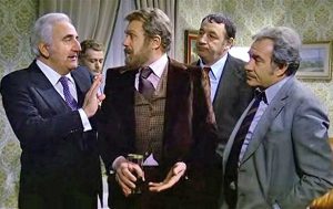 Al centro, Gastone Moschin, in una scena di Amici miei