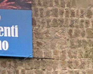 Vitorchiano - Il cartellone pubblicitario appeso alle mura civiche