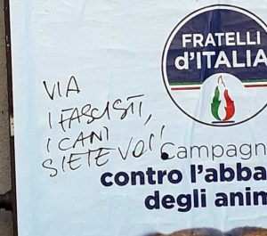 Il manifesto di FdI contro l'abbandono degli animali imbrattato dai vandali