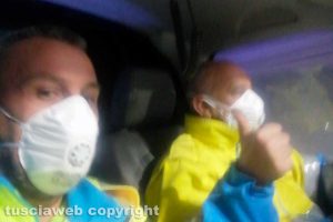 Brescia - I due volontari della Misericordia
