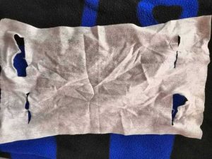 Una mascherina in dotazione degli agenti penitenziari