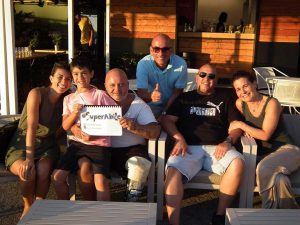 Simone Moi con lo staff di Superabile