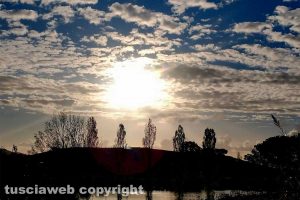 Cerveteri - Riflessi di luce all'alba nel laghetto di pesca sportiva al Sasso