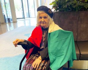 Melbourne - Licia Marinelli con la bandiera salvata