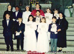 Don Alfredo Cento e al centro il piccolo Leonardo Bonucci