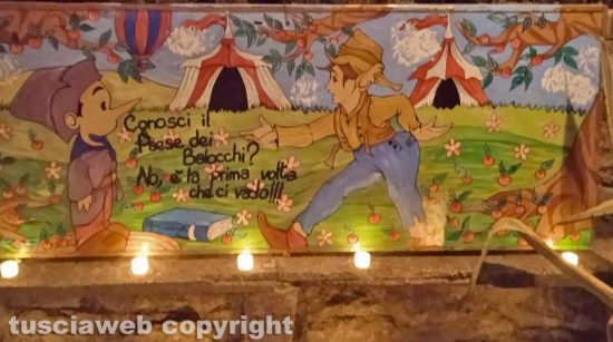 Capranica - Sogni di luce - Pinocchio, mastro Geppetto, il gatto e la volpe risplendono nel centro storico 