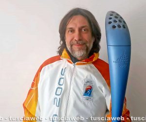 Claudio Fordini Sonni oggi, con divisa e fiaccola del 2006